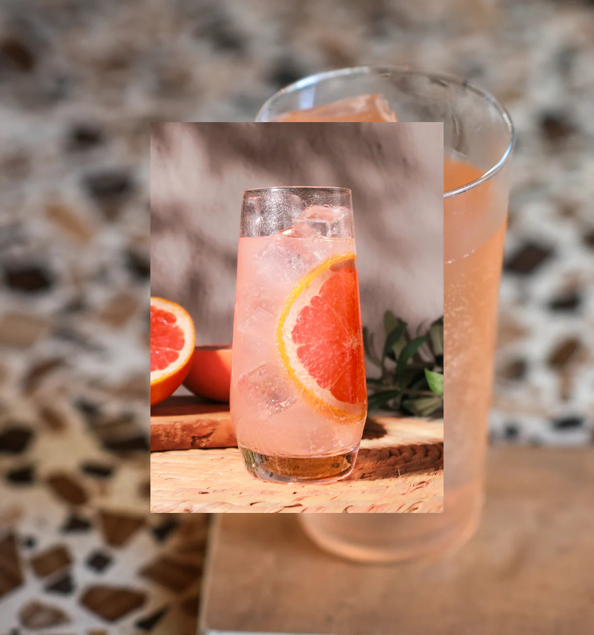 Aegean Paloma cocktail with sliced grapefruit