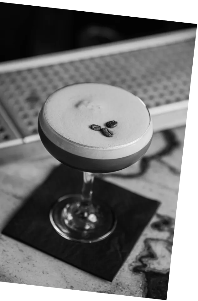 Black and white picture of an Axpresso Martini on a bar