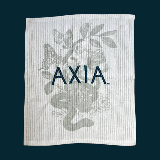 Axia Spirit Bar Towel on a dark blue background