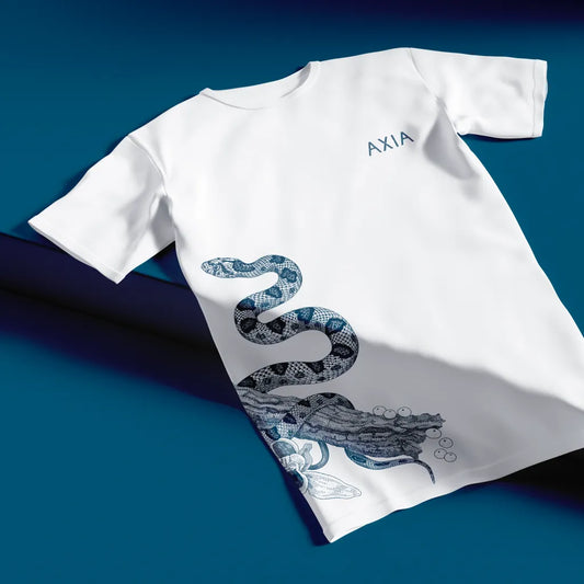 Axia Spirit White Cotton T-shirt branded merch on a dark blue background. T-shirt has the Axia dark blue snake on the bottom left side and the Axia logo on the top right.