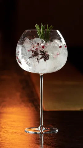 Axia Tonic Cocktail on a wooden table