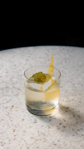 Axia White Negroni Cocktail on a table
