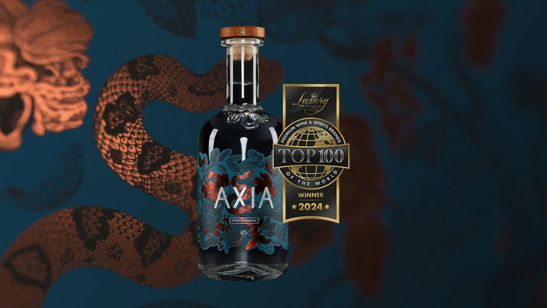 Axia Mastiha Spirit bottle with the award logo of the Top 100 Premium Wine and Spirits Brands of the world Winner 2024 above it