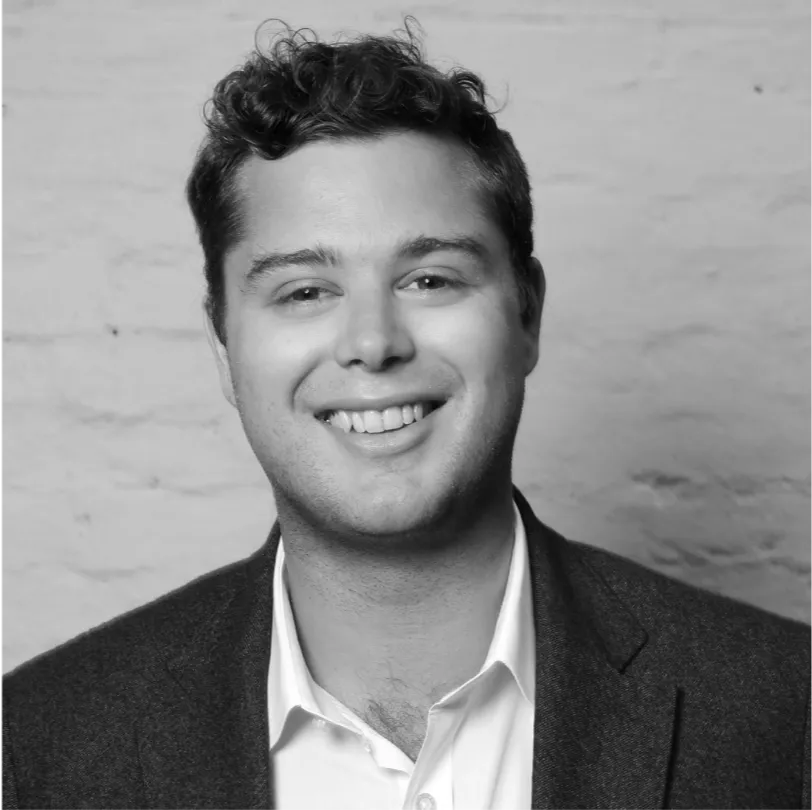 Black and white portrait of Adrian Clarke, Chairman at Delarki Limited