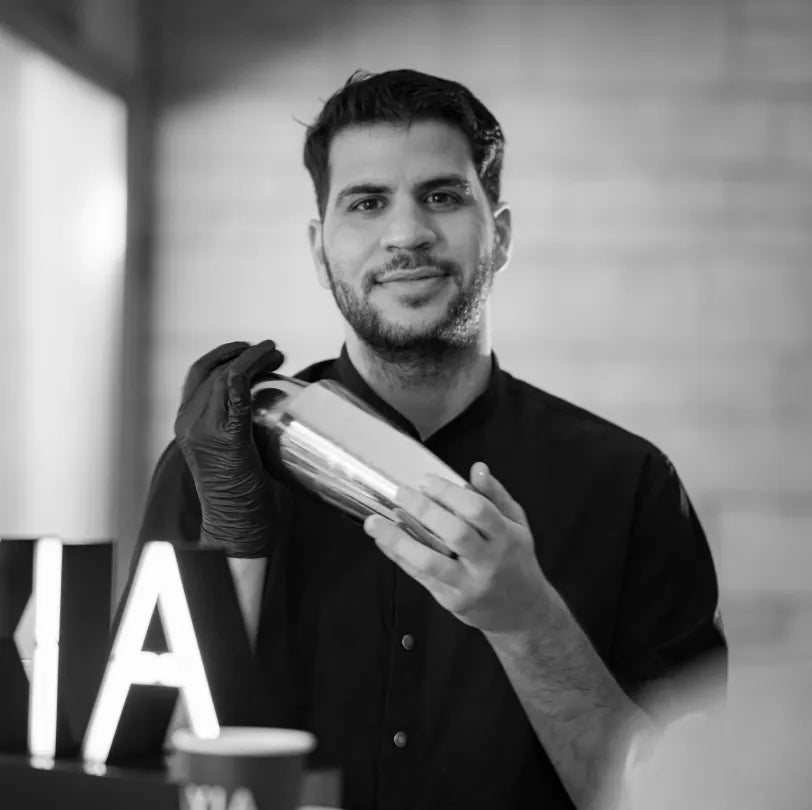 Black and white portrait of Babis Baldoumis, Assistant Brand Ambassador of Axia Spirit in Greece