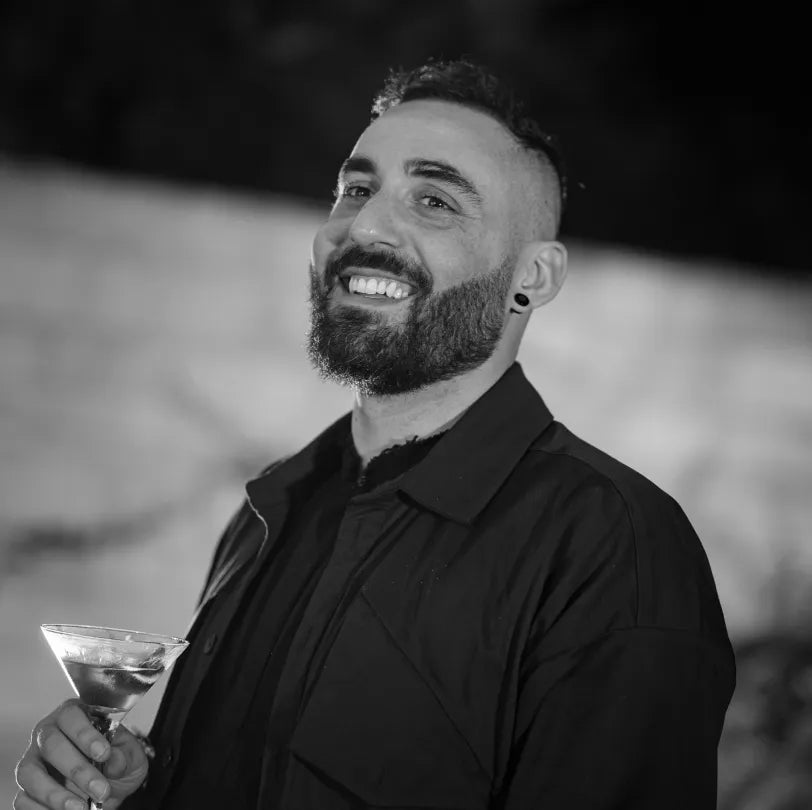 Black and white portrait of Giannis Miliotis, Global Brand Ambassador of Axia Spirit