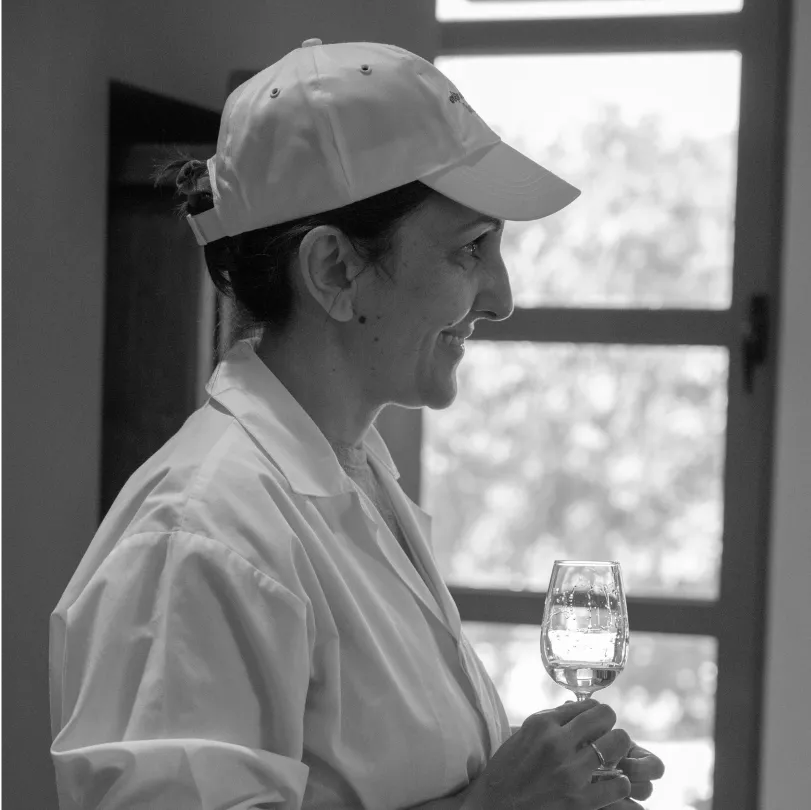 Black and white portrait of Maroussa Tsachaki, Master Distiller at Axia Spirit