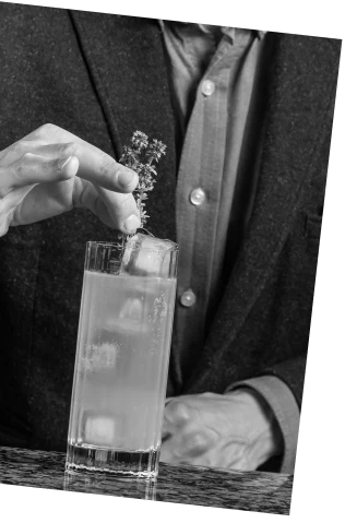 Black and white picture of an Axia and South Lodge Mediterranean Mule Cocktail