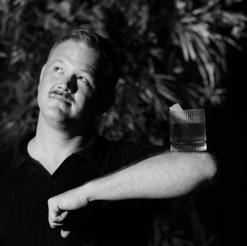 Black and white portrait of Mitchel Bauer, Brand Ambassador of Axia Spirit in the USA